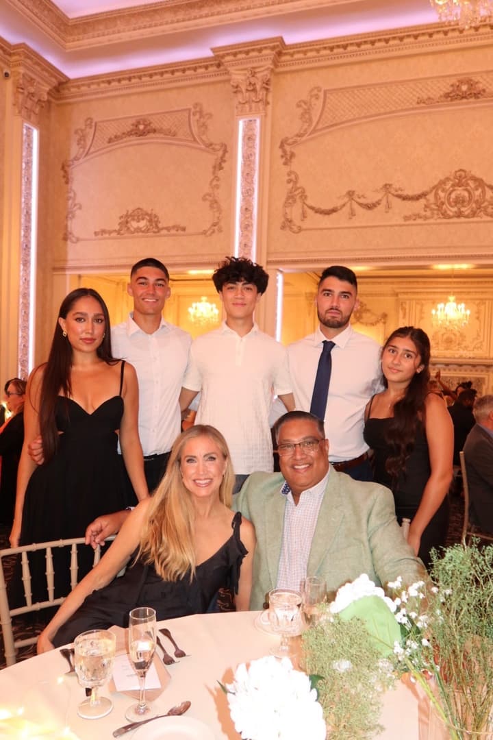 Neal Prasad with his wife Kimberly and their five children